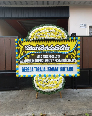 Papan Bunga Duka di Dendengan Dalam